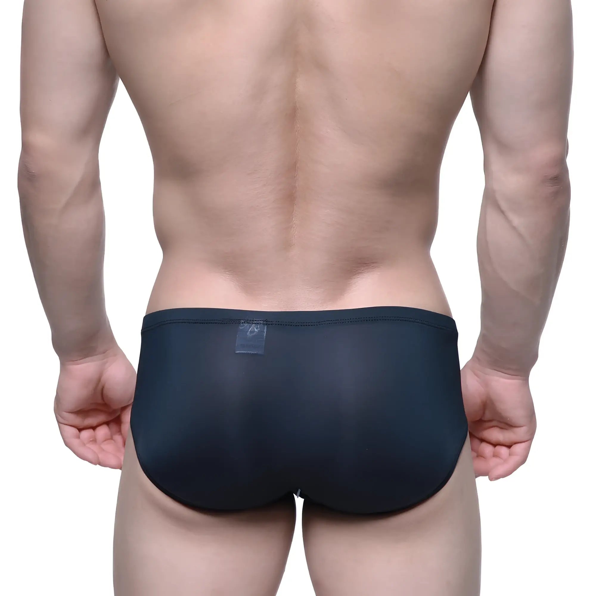 MetroMaleWear Entropy bikini black swim trunks with smooth stretchy fabric and a small transparent waistband label