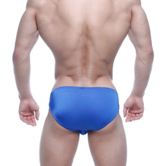 Bright blue metro malewear eureka bikini swim trunks with smooth slightly shiny fabric and a form-fitting design