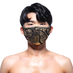 A black and gold sequined face mask with an intricate paisley design by MetroMaleWear metal paisley gold 0111-61