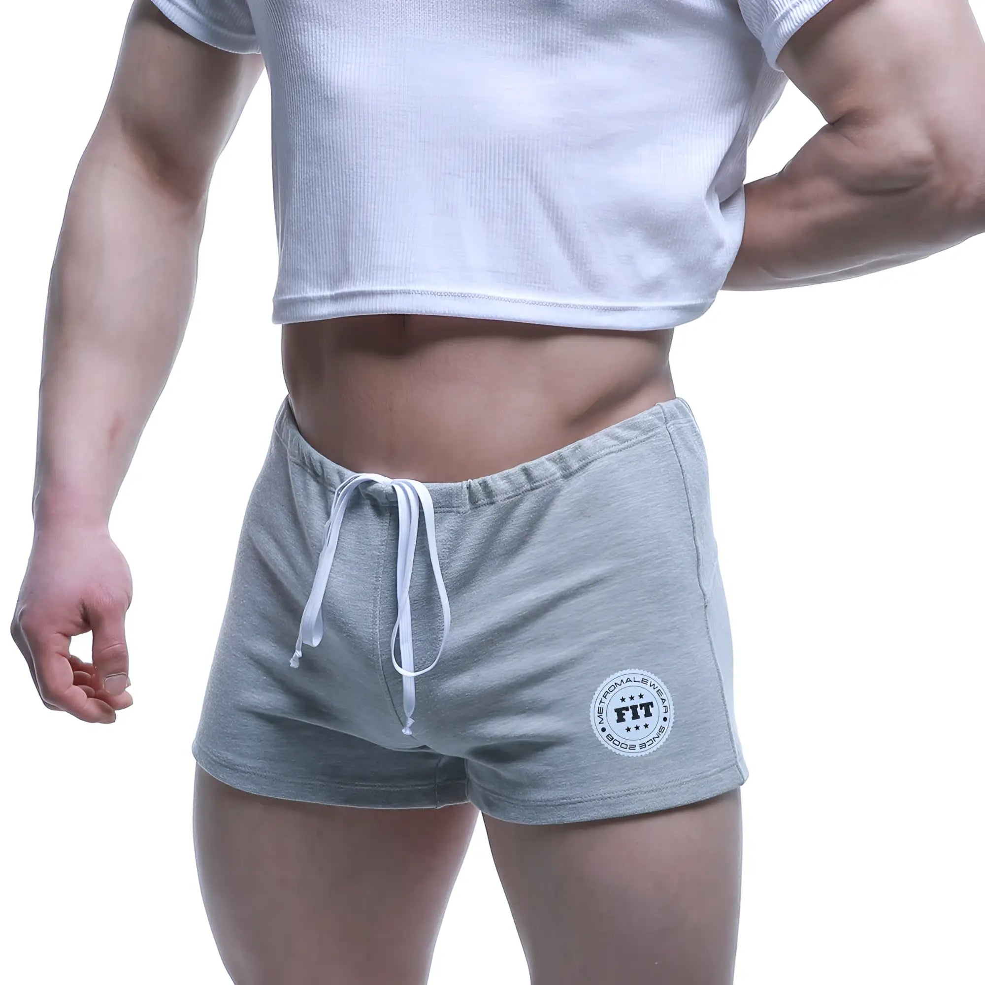 Metro malewear fit shorts gray heathered sweatshorts with white drawstring and circular fit logo patch on lower left leg