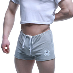 Metro malewear fit shorts gray heathered sweatshorts with white drawstring and circular fit logo patch on lower left leg