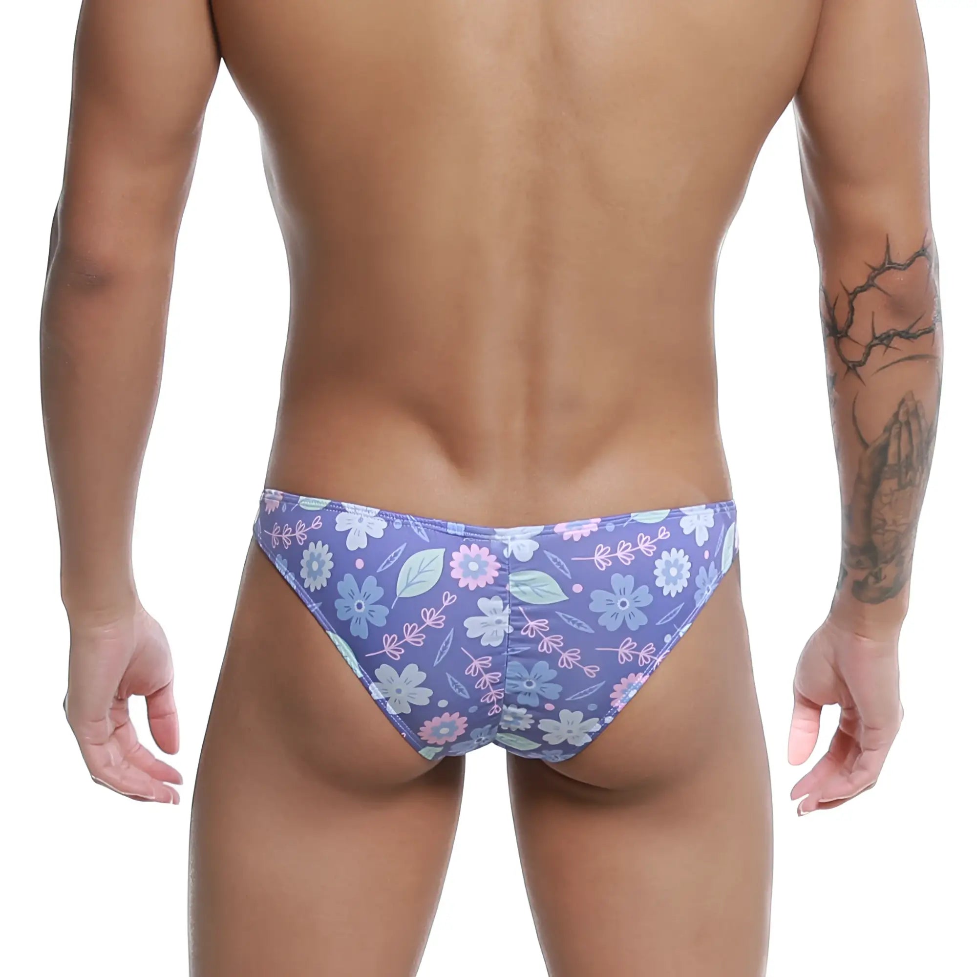 Purple floral-patterned men’s briefs with light blue pink and white flowers by metro male wear fits bikini jardin 6603-44