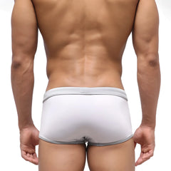 White briefs with subtle gray trim along waistband and legs from metromalewear fresco swim trunk crystal 4944-00 collection