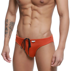 MetroMaleWear hunter swim brief ochre 4977-13 orange swim trunks with black drawstring ties and a white brand tag