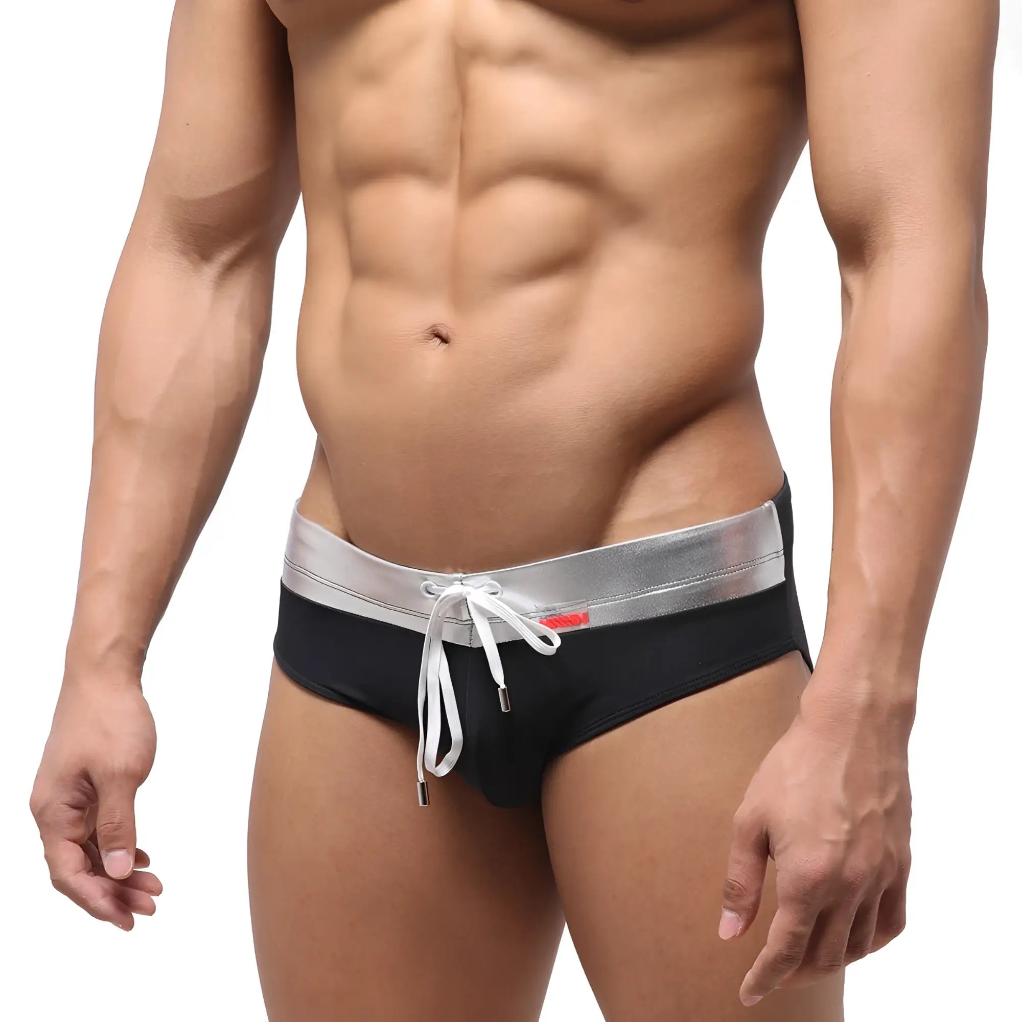 Black metroMalewear ibiza swim brief with silver metallic waistband and white drawstring in front view