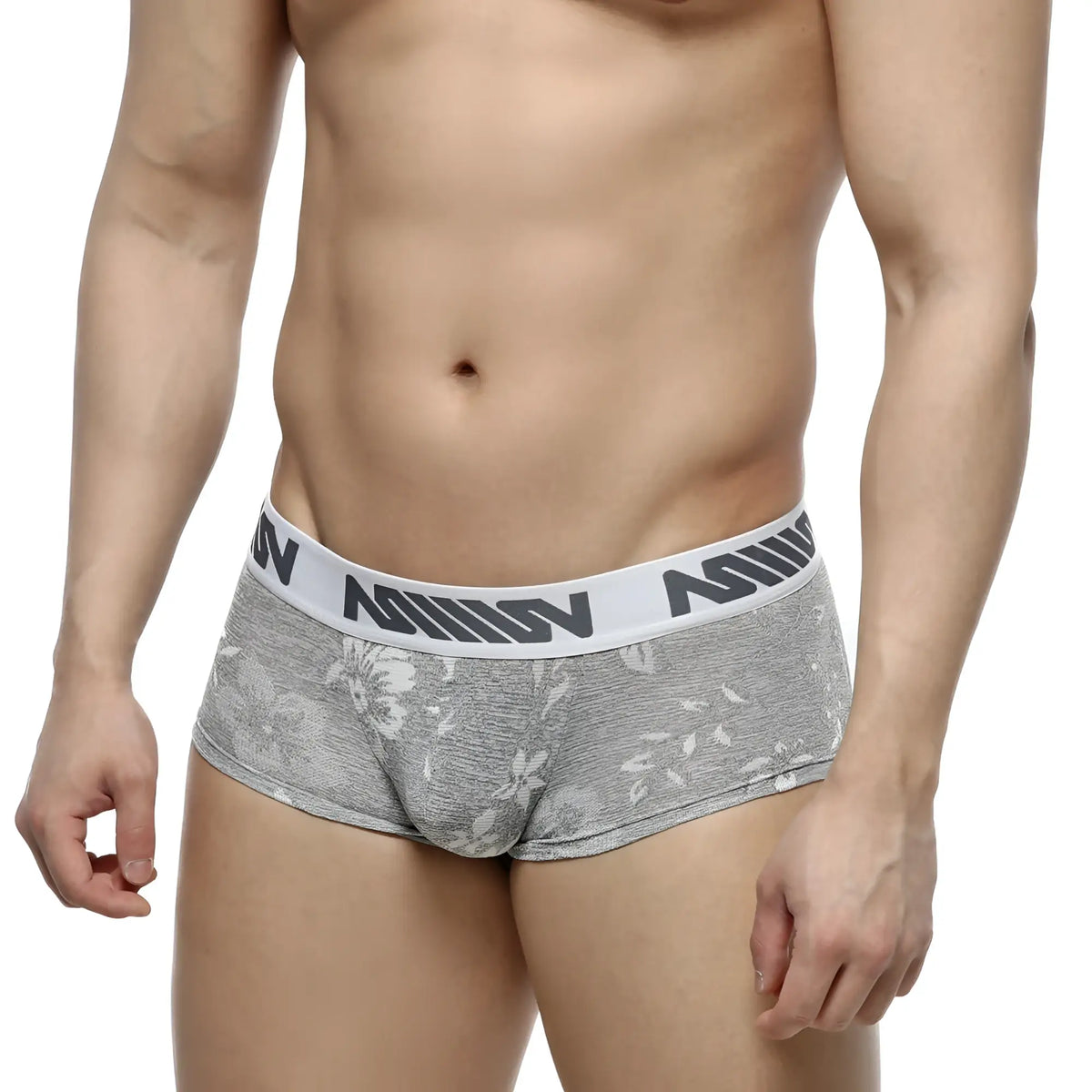 Gray jacquard floral patterned briefs with white elastic waistband featuring black nomin lettering metro male wear