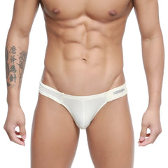 MetroMaleWear Malon bikini nude briefs with sleek form-fitting design and subtle elastic waistband by White arrow