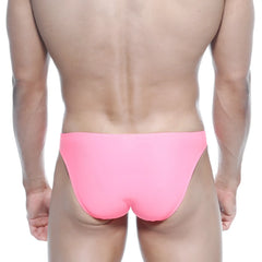 Bright pink sleek form-fitting swim trunks by metromalewear max bulge bikini fuchsia 6007-02 for swim use