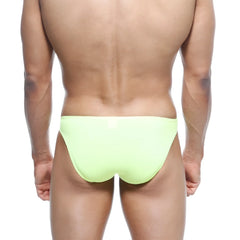 A sleek neon green MetroMaleWear Max Bulge brief swimsuit with smooth, form-fitting design