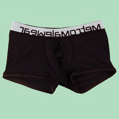Black mens briefs with white elastic waistband featuring meltomagwear branding from metroamalewear max bulge boxer brief