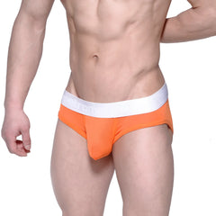 MetroMaleWear max mesh hip brief in orange with white elastic waistband featuring men’s brand name in gray