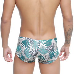 MetroMaleWear Meadow Trunk 2125-56 tropical leaf-patterned swim trunks in teal white and gray for beachwear