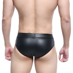 Black glossy faux leather swim trunks metal hip brief by metromalewear with sleek form fitting design