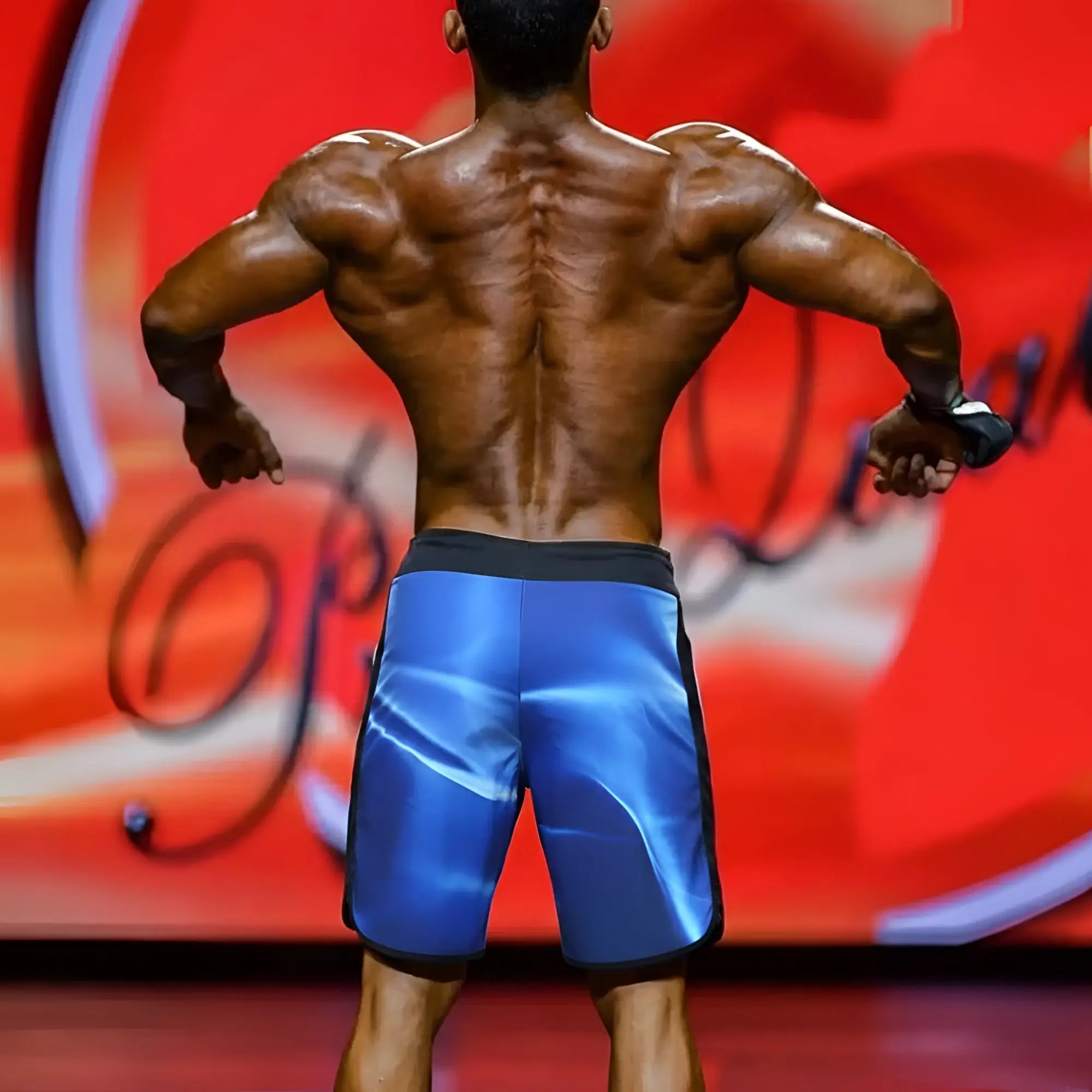 Blue metromalewear metro musclewear ifbb pro mens physique board short with glossy finish and black trim