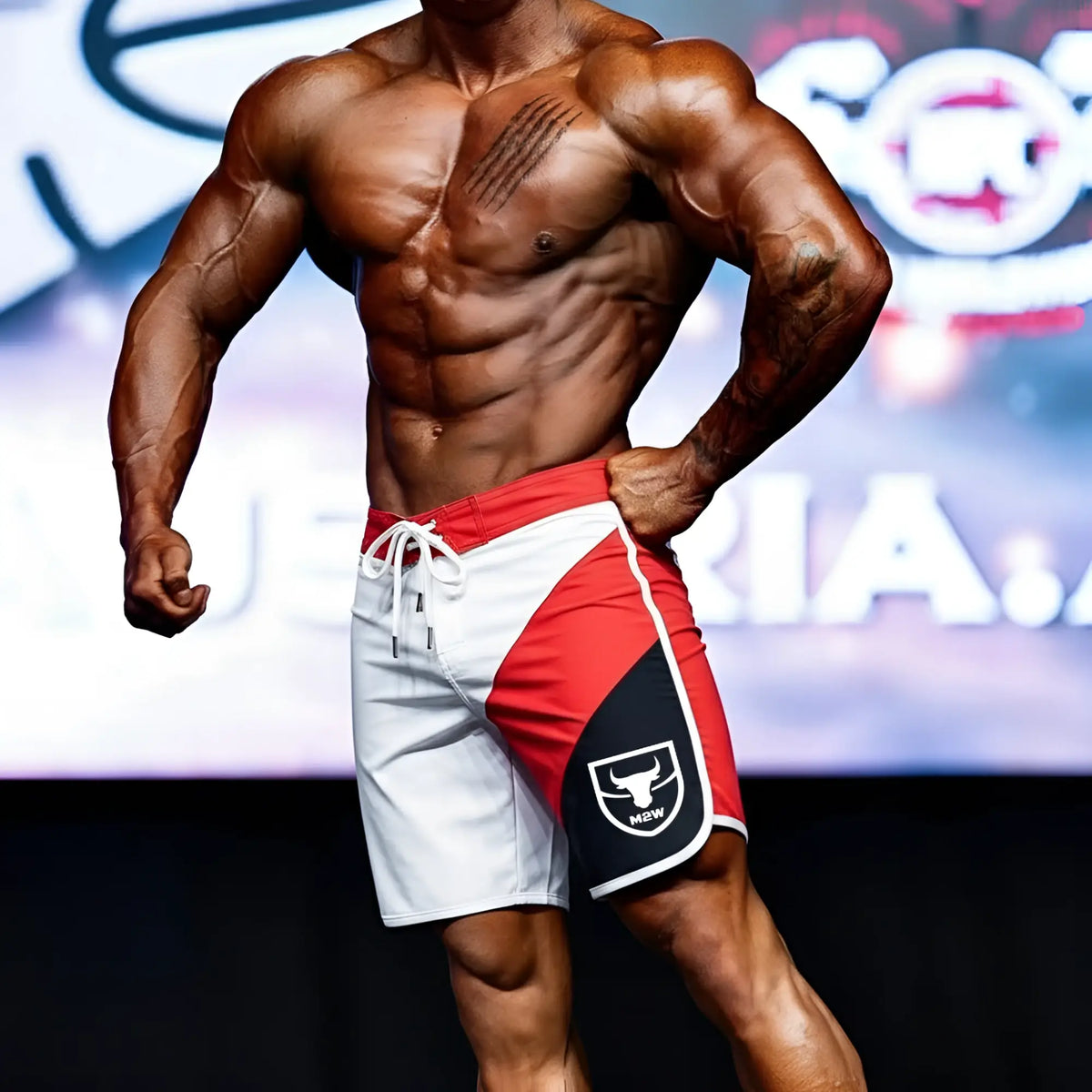 Red white and black MetroMaleWear MetroMuscleWear IFBB Pro mens physique board shorts with bull logo on side