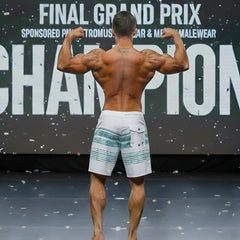 White board shorts with teal horizontal stripes and front pocket from MetroMaleWear MetroMuscleWear Innocent Physique