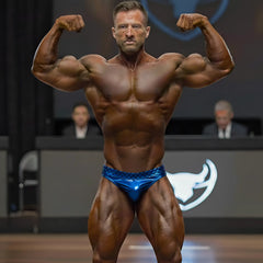 Shiny blue metallic briefs with a subtle scale pattern metro malewear metro musclewear competition suit cobalt