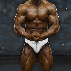 White athletic briefs with silver metallic zipper and buckle detail from MetroMaleWear MetroMuscleWear muscle competition suit
