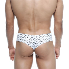 White briefs with bold black geometric and mustache pattern featuring arrow brand name metroMalewear micro cheek caballero 2027-03
