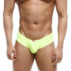Bright neon yellow metro malewear micro cheek men’s briefs with red and white brand tag on waistband