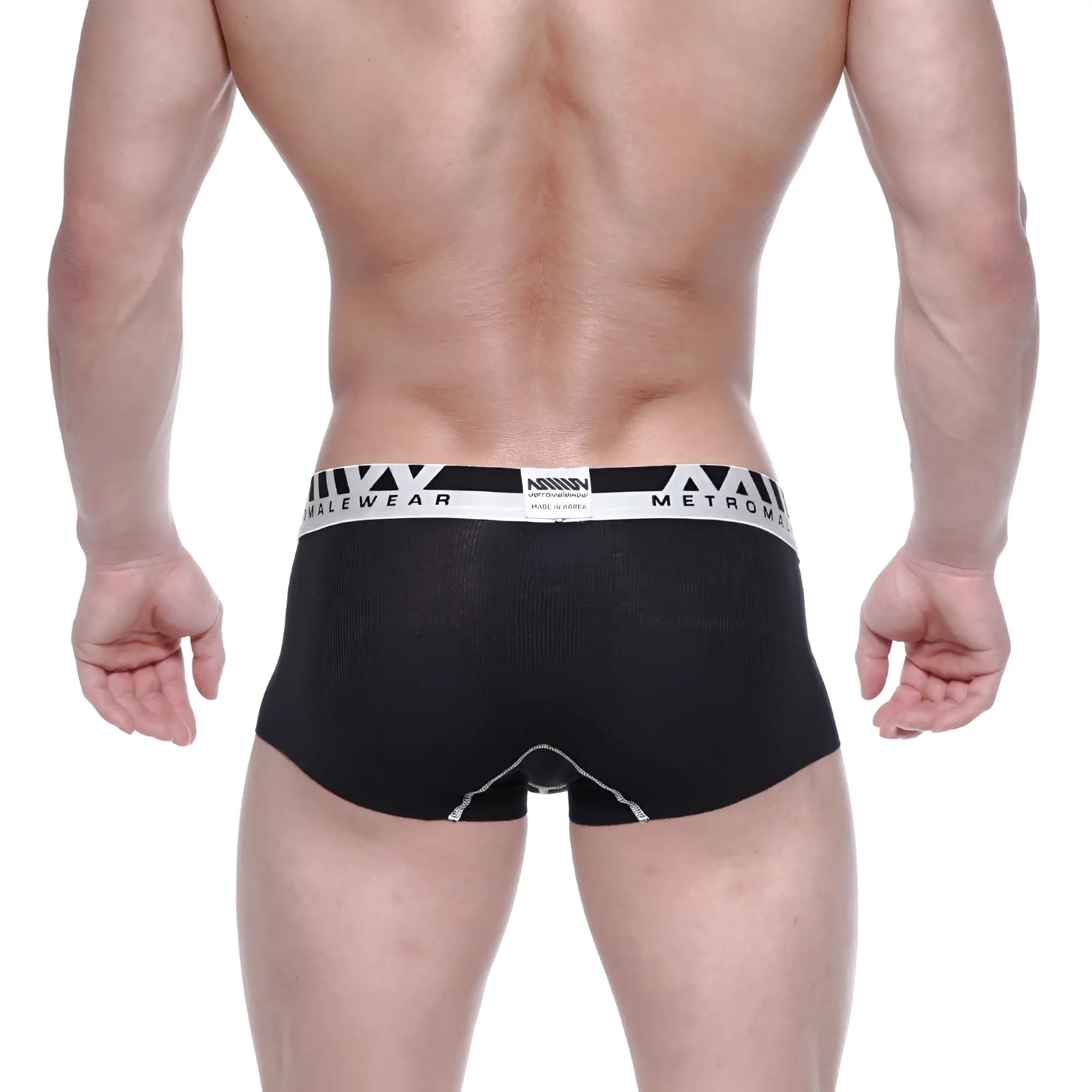 Black men’s briefs with white metroman waistband made of textured modal fabric seamless trunk style