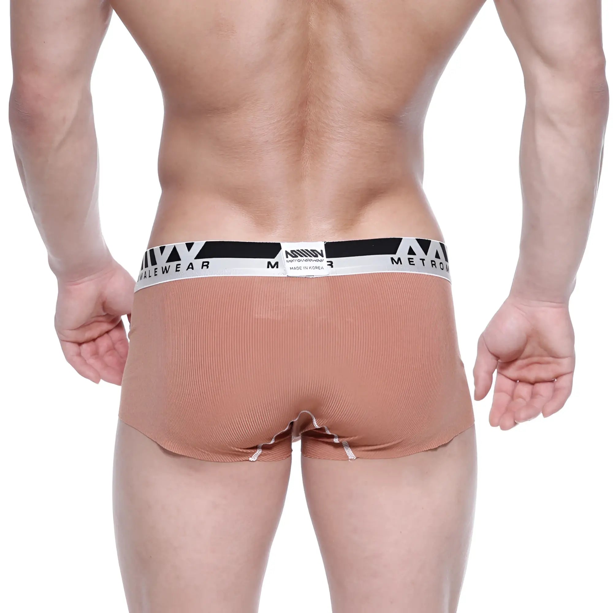 Tan ribbed men’s briefs with black and white branded waistband made from modal seamless fabric by metro male wear
