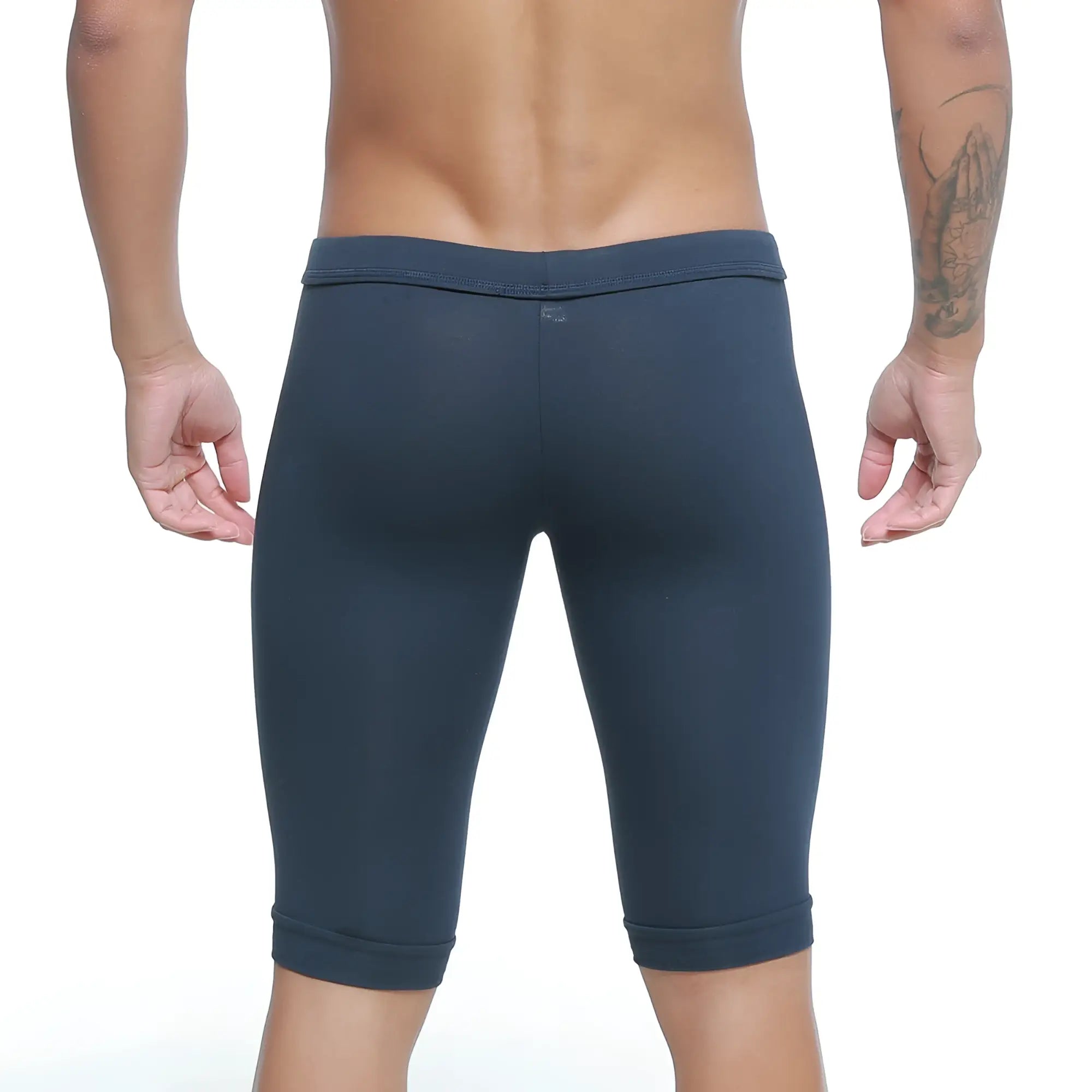 Dark blue form-fitting capri-length leggings with smooth stretchy fabric and rolled cuffs from MetroMaleWear Mojave Biker 3020-28