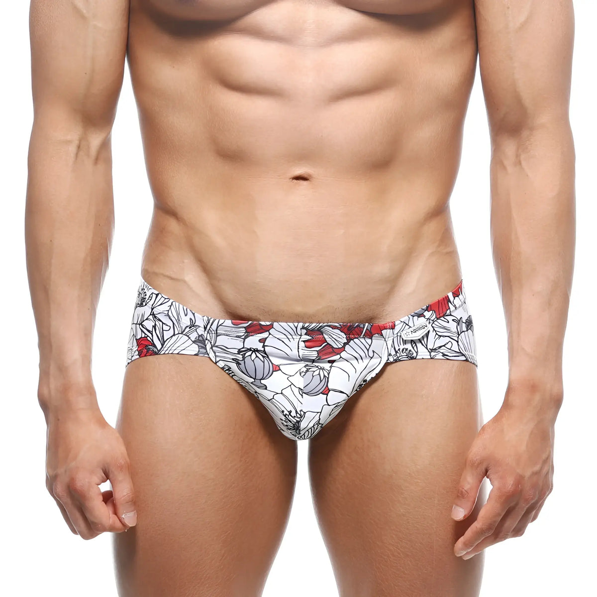 White swim trunks by MetroMaleWear Mojito Bikini Escobar 1006-09 with bold red and gray floral pattern