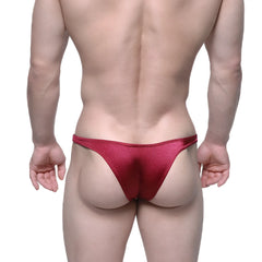 A shimmering red metallic MetroMaleWear Monaco bikini thong with a sleek form-fitting design in burgundy