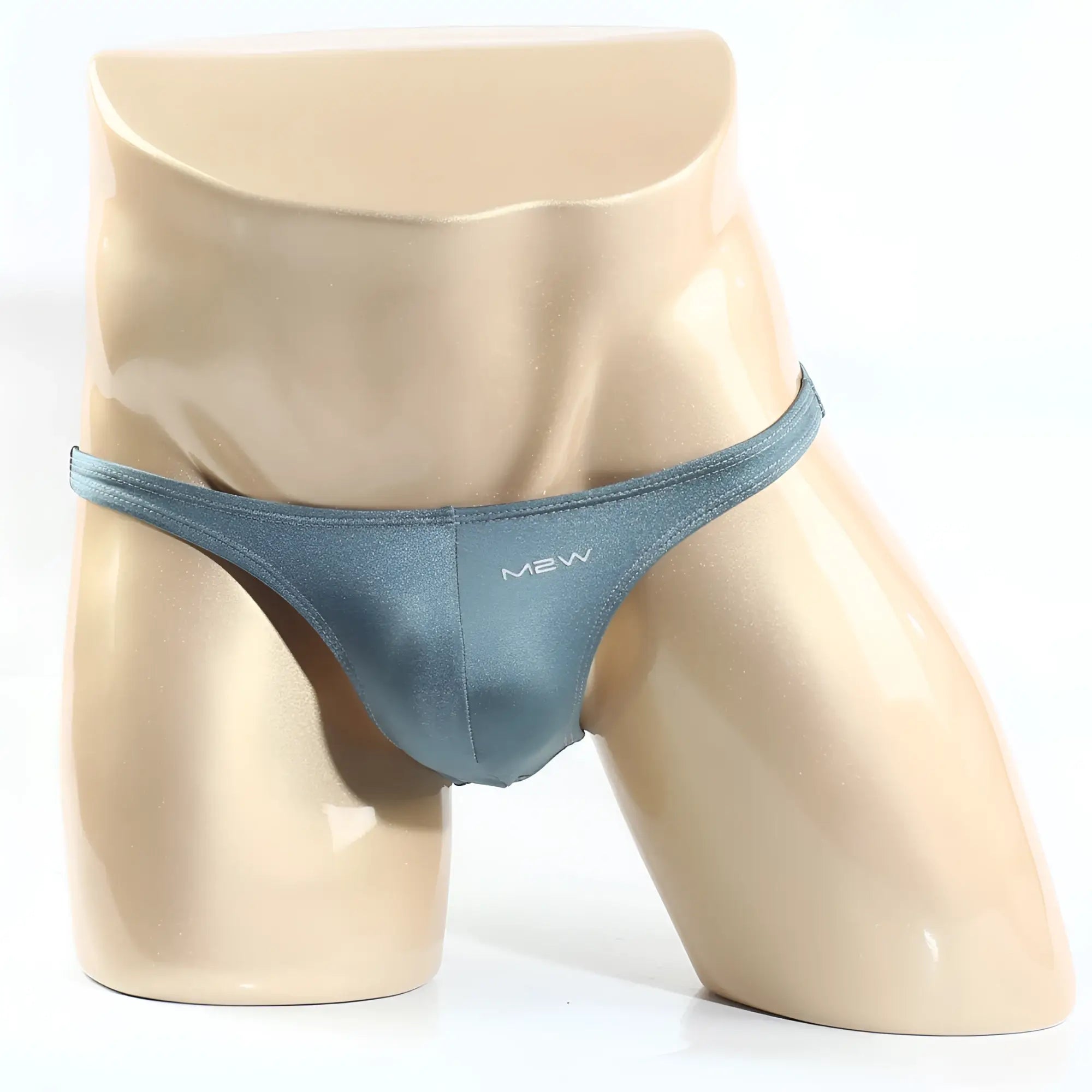 A sleek teal metro male wear monaco bikini thong made of smooth shiny fabric for stylish comfort