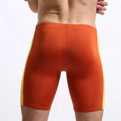 MetroMaleWear New Jammer swim boxer in orange and yellow with a snug, form fitting design for athletic use