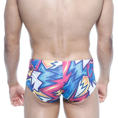 MetroMaleWear Oscar boxer atractivo swim trunks with vibrant blue pink and yellow zigzag graffiti-style pattern