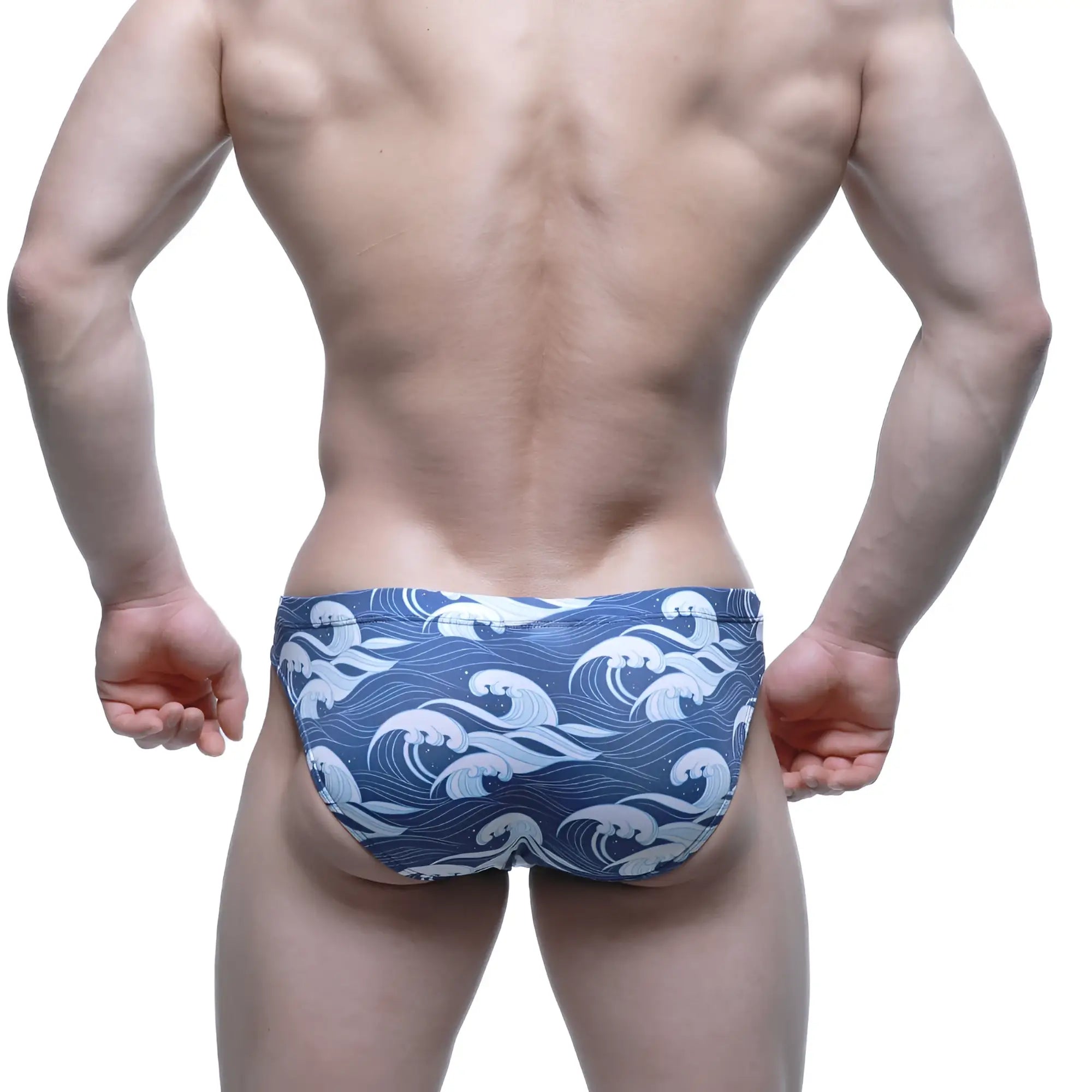 Blue swim trunks by metromalewear featuring a white wave pattern ideal for beach and pool use