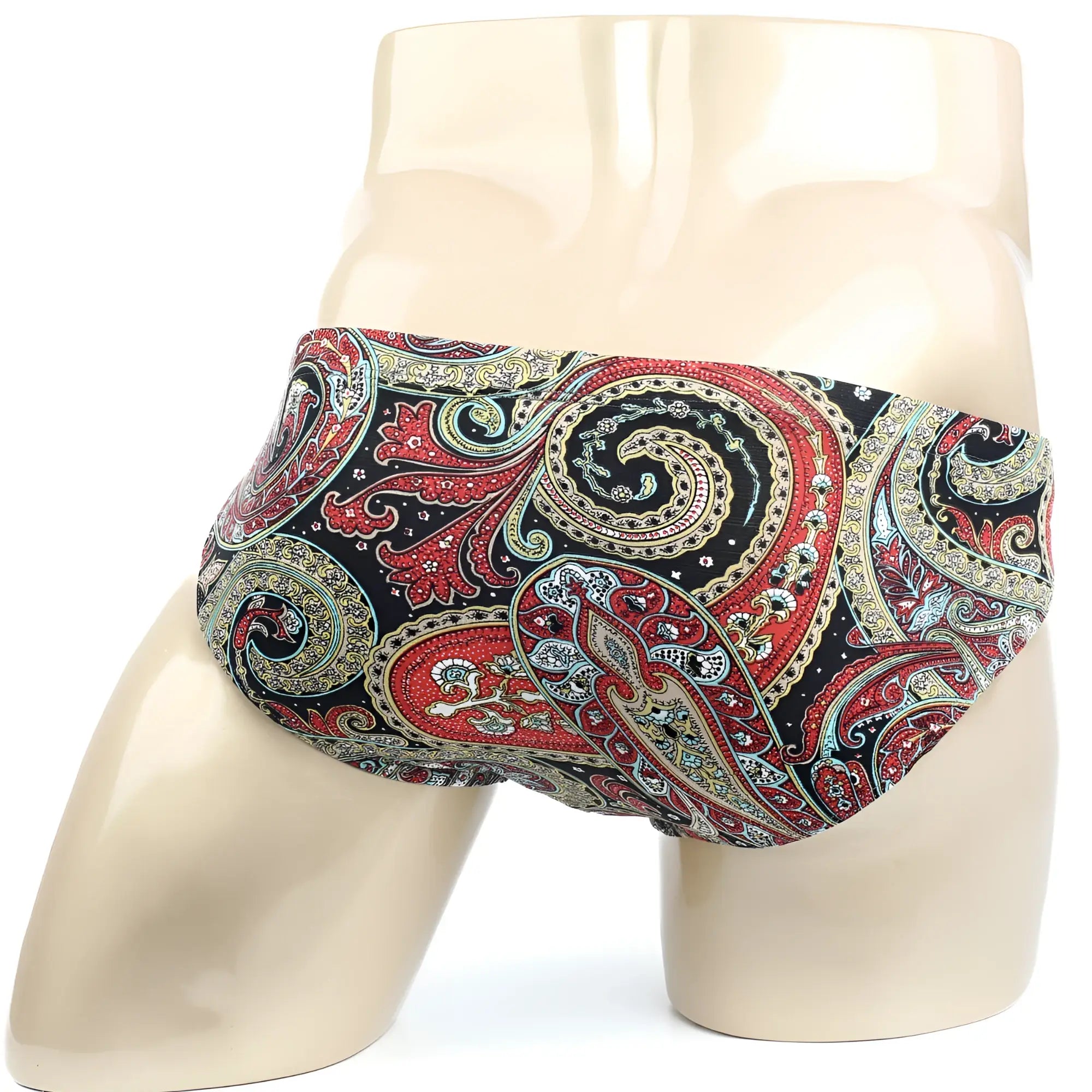 MetroMaleWear paisley bikini 5103-99 men’s briefs in vibrant red gold and teal paisley pattern displayed on mannequin