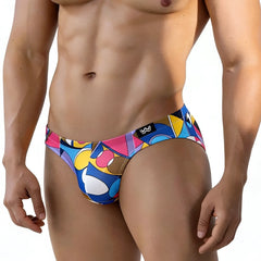 Vibrant geometric-patterned metro malewear picasso bikini 5103-m87 swim trunks in blue pink yellow white with black logo tag