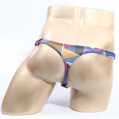 MetroMaleWear Picasso Thong 2302-M87 is a colorful geometric-patterned stretchy fabric thong in blue purple yellow and pink