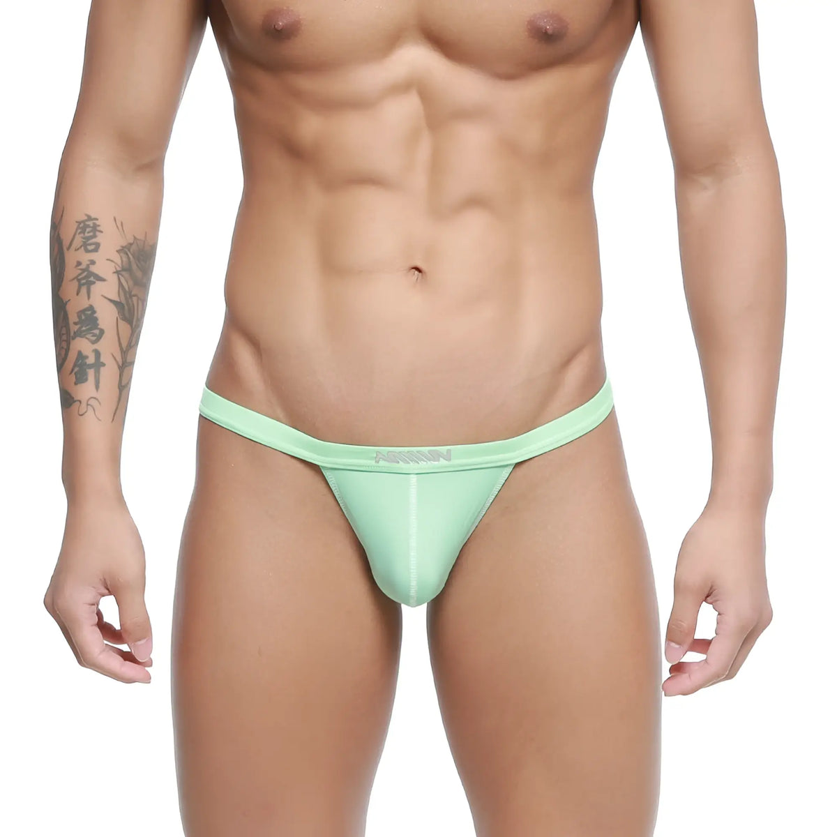 Mint green nylon thong by MetroMaleWear with a subtle brand logo on the waistband for comfortable wear