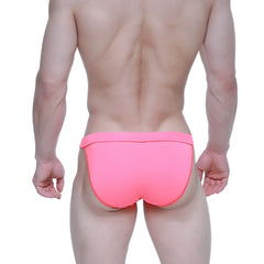 Bright pink snug fit swim trunks with matching zipper detail on the side seam from metromalewear plano bikini 3334-02