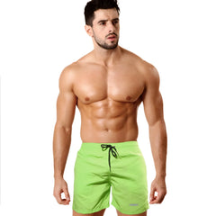 Bright lime green neon swim trunks with black drawstring waistband from MetroMaleWear pool party short 4773-07