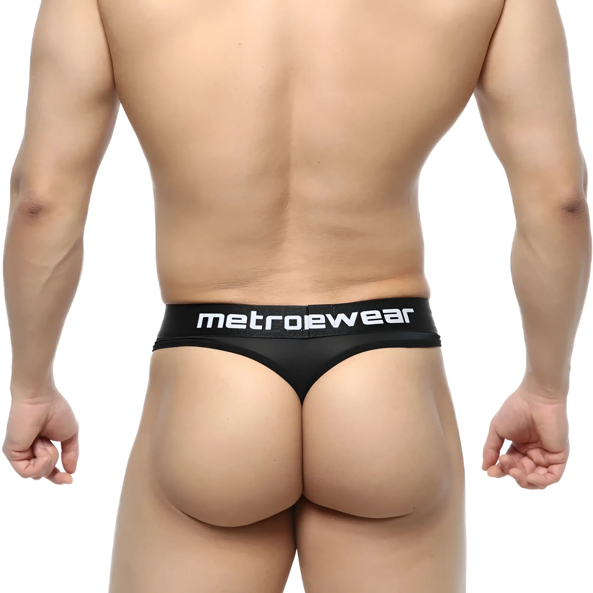 Black MetroMaleWear Prado thong with sleek minimalist design and white branded waistband shown from back side