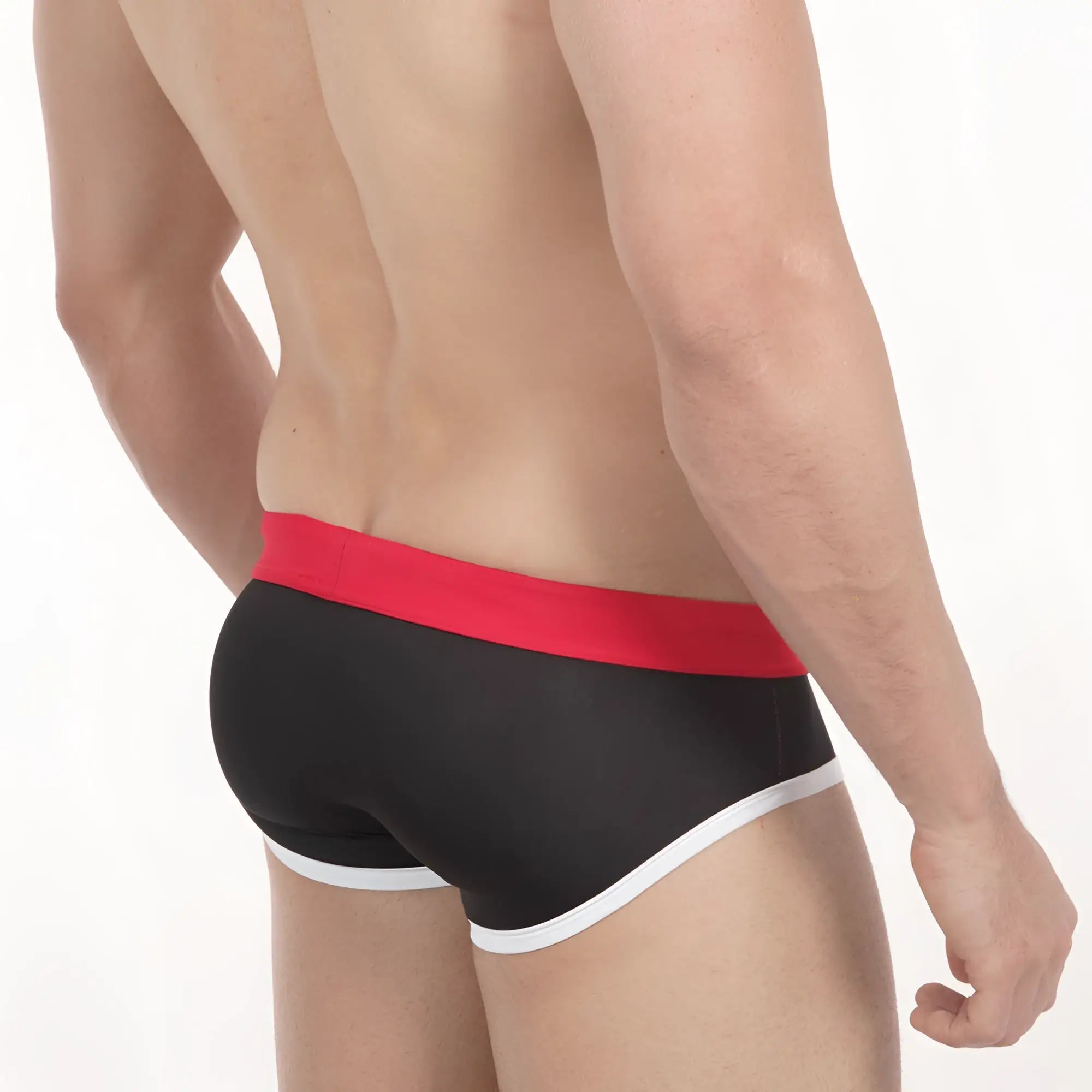 Black briefs with bold red waistband and white trim along leg openings metroMalewear pride swim brief 4916-78