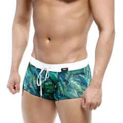 MetroMaleWear Profundo swim boxer briefs with green tropical leaf pattern and white waistband with drawstring
