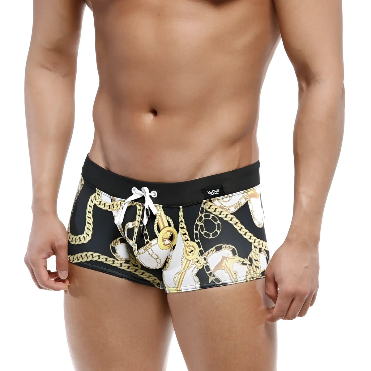 Black swim boxer briefs metroMalewear profundo lujos 4986-99 with bold gold and white chain pattern and black waistband