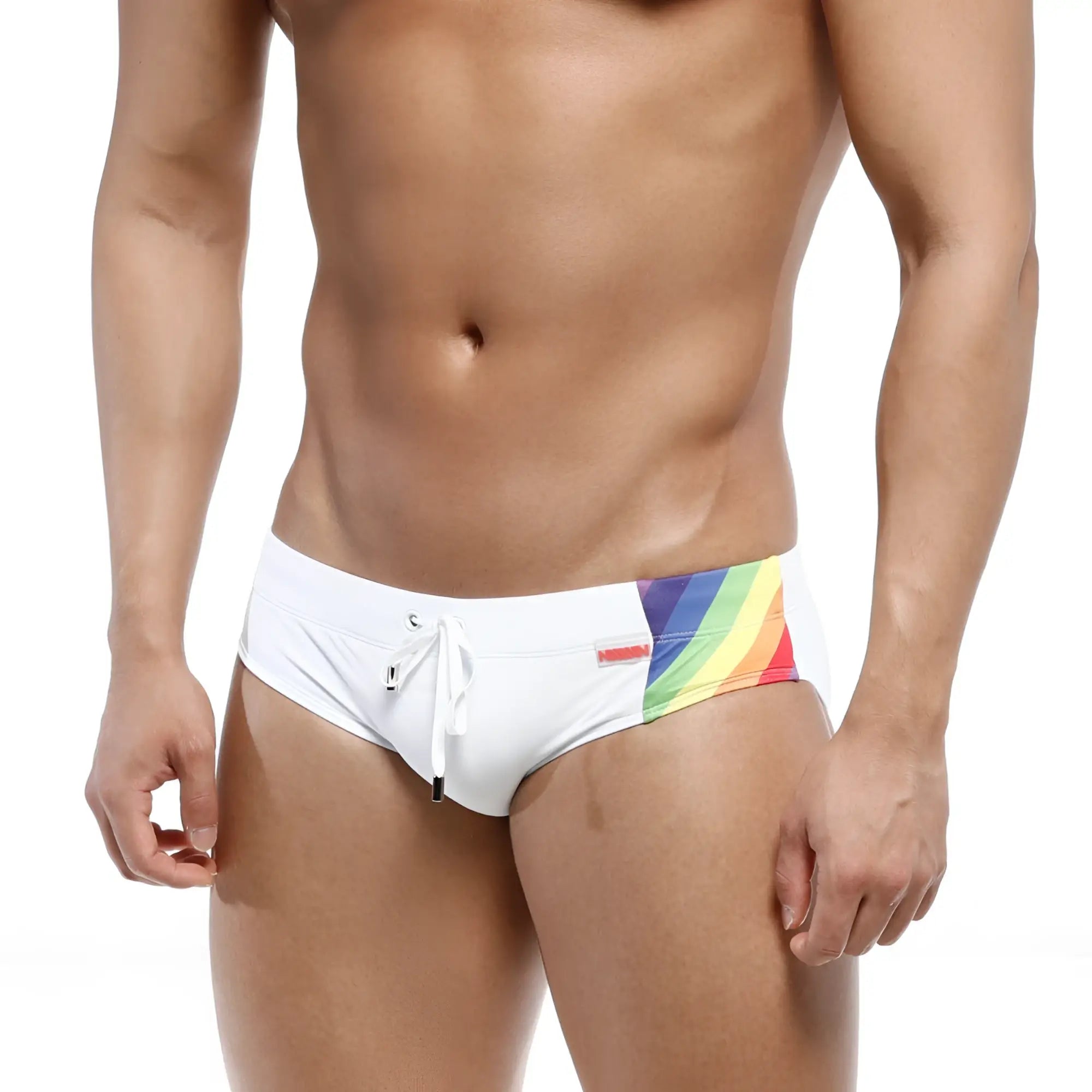 White MetroMaleWear swim trunks featuring a vibrant rainbow stripe and a small red brand tag on the side