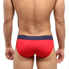 Red metro malewear reno swim brief featuring a navy blue waistband designed for comfortable swimming