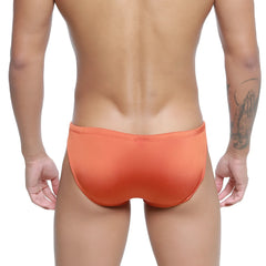 Orange textured silicon swim bikini briefs by metromalewear in ochre designed for comfortable swimwear use