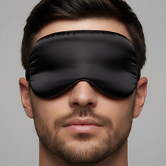 Black satin sleep mask with smooth glossy finish and elasticized edges by MetroMaleWear silky eye mask
