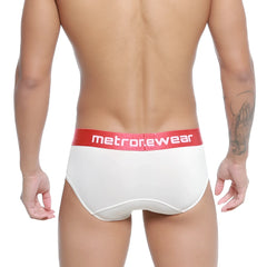White briefs with a red waistband featuring the metronewear logo in white lettering metroamalewear soft brief 5106-02