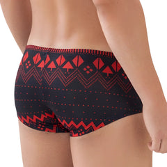 Black swim trunks by MetroMaleWear with bold red geometric zigzags triangles and dotted lines pattern