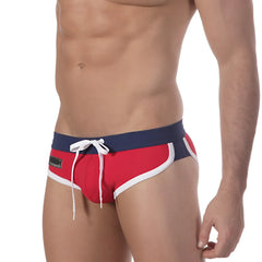 Red and navy blue MetroMaleWear split swim brief with white trim and drawstring waistband for swimming